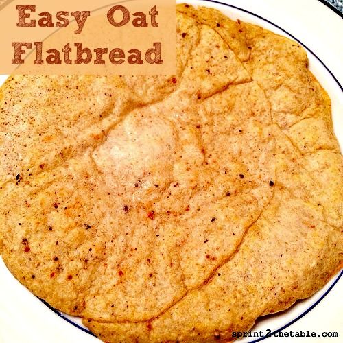 an easy oat flatbread on a plate with the words, easy oat flatbread