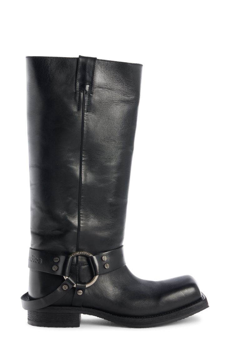 This moto-inspired stirrup-harness boot is made in Italy from smooth calfskin leather and enhanced with a square toe and thick rubber-crepe sole. Pull-on style Leather upper and lining/rubber sole Made in Italy Designer Shoes Calf Leather Snip Toe Boots With Buckle, Western Moto Boots With Square Toe In Calf Leather, Western Moto Boots With Calf Leather And Leather Lining, Moto Leather Boots With Snip Toe, Edgy Leather Moto Boots With Snip Toe, Leather Moto Boots With Buckle Closure For Riding, Leather Moto Boots With Buckle For Riding, Leather Moto Boots For Riding, Leather Moto Boots With Buckle Closure And Square Toe