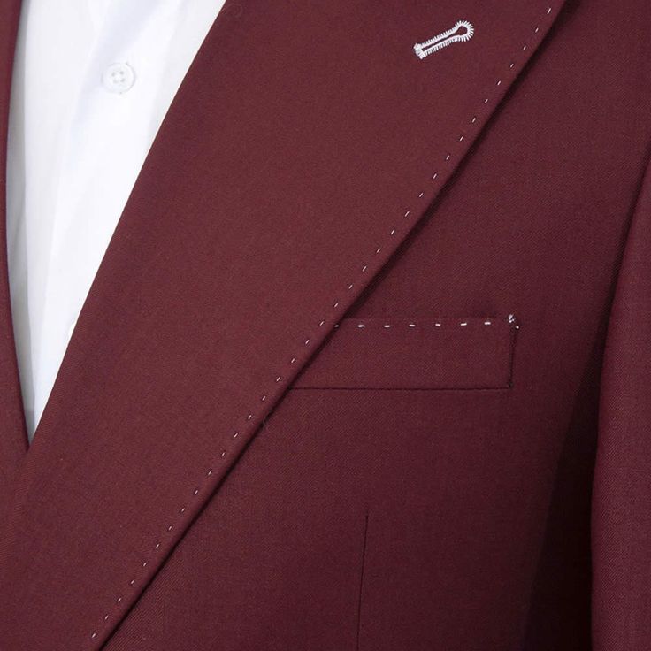 Package Includes: 1 x Jacket - 1 x Pant

Experience sophisticated style with Andre Emilio's Burgundy Double Breasted Suit, featuring meticulous pick stitch detailing and elegant white buttons. Shop now for free shipping on all orders. Transform your wardrobe and make a lasting impression.

 	Fabric: 100% Wool
 	Yarn: 120s
 	Lining Fabric: Silk
 	Pattern: Solid
 	Buttons: White Brass
 	Construction: Half Canvas
 	Seasonality: All Season
 	Jacket: Peak Lapel, 2 Flap Pockets, Double Breasted Closur Designer Suits With Double Button And Lapel Collar, Designer Suit With Double Button Closure And Lapel Collar, Single Breasted Suiting Fabric Sets For Tailoring, Single Breasted Tailoring Sets In Suiting Fabric, Slim Fit Three-piece Suit With Suit Collar, Slim Fit Three-piece Suit With Buttons, Slim Fit Sets With Notch Lapel And Buttons, Three-piece Suit With Button Closure For Formal Occasions, Designer Notch Lapel Sets For Work