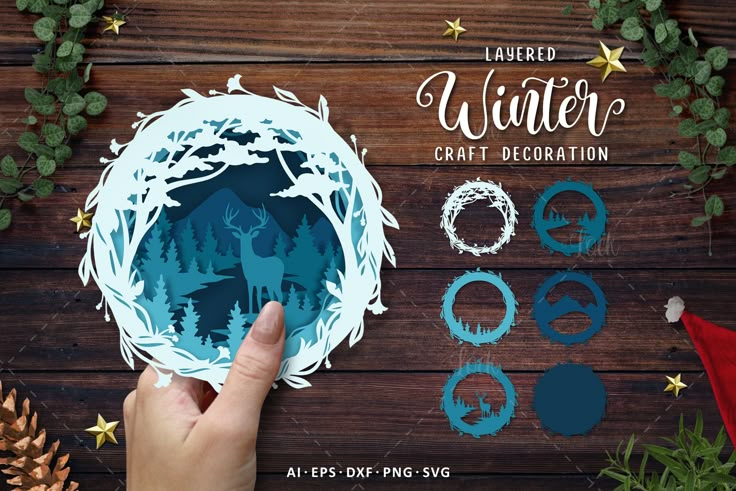 the paper cutout is being used to create a winter scene with deers and pine cones