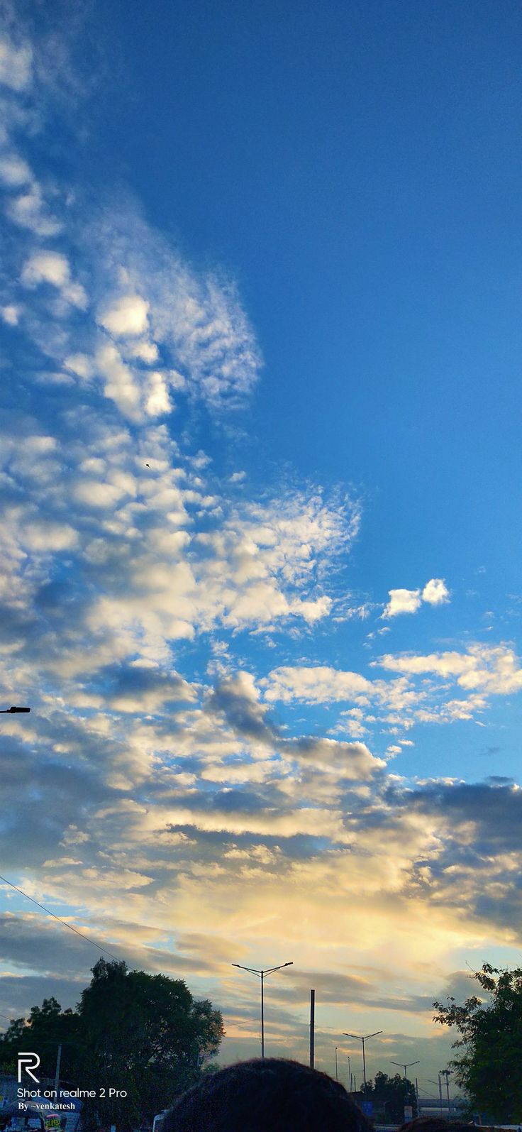 the sky is filled with clouds and blue skies