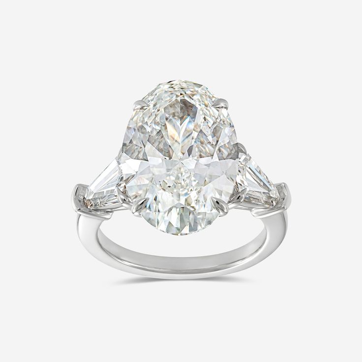 an oval and baguette cut diamond ring