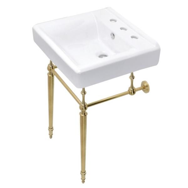 a white sink sitting on top of a metal stand with two holes in the middle