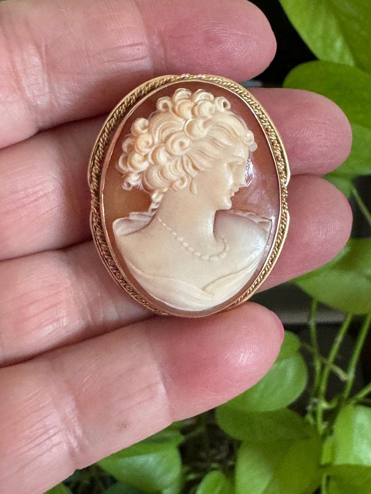 "Stunning 14K gold petite Cameo Pin and Pendant.  Has a fold down bale so you can wear this as a brooch or pendant.  1.50\" High with out bale x 1.20\" wide Hallmarked both on the pin back and the frame 14K gold Package will ship priority Mail Insured.  For more items click on :  http://www.etsy.com/shop/MISSIONMOD?ref=pr_shop_more  **ALL METALS AND STONES ARE TESTED TO BE SUCH,BUY WITH CONFIDENCE THAT HERE AT MISSION*MOD WE STRIVE TO BRING YOU THE BEST WE CAN FIND...RANGING FROM VINTAGE TO ANTI Jewelry Clothing, Antique Clothing, Pin Brooch, Priority Mail, Antique Jewelry, Small Gifts, Vintage Antiques, Brooch Pin, Jewelry Necklace Pendant