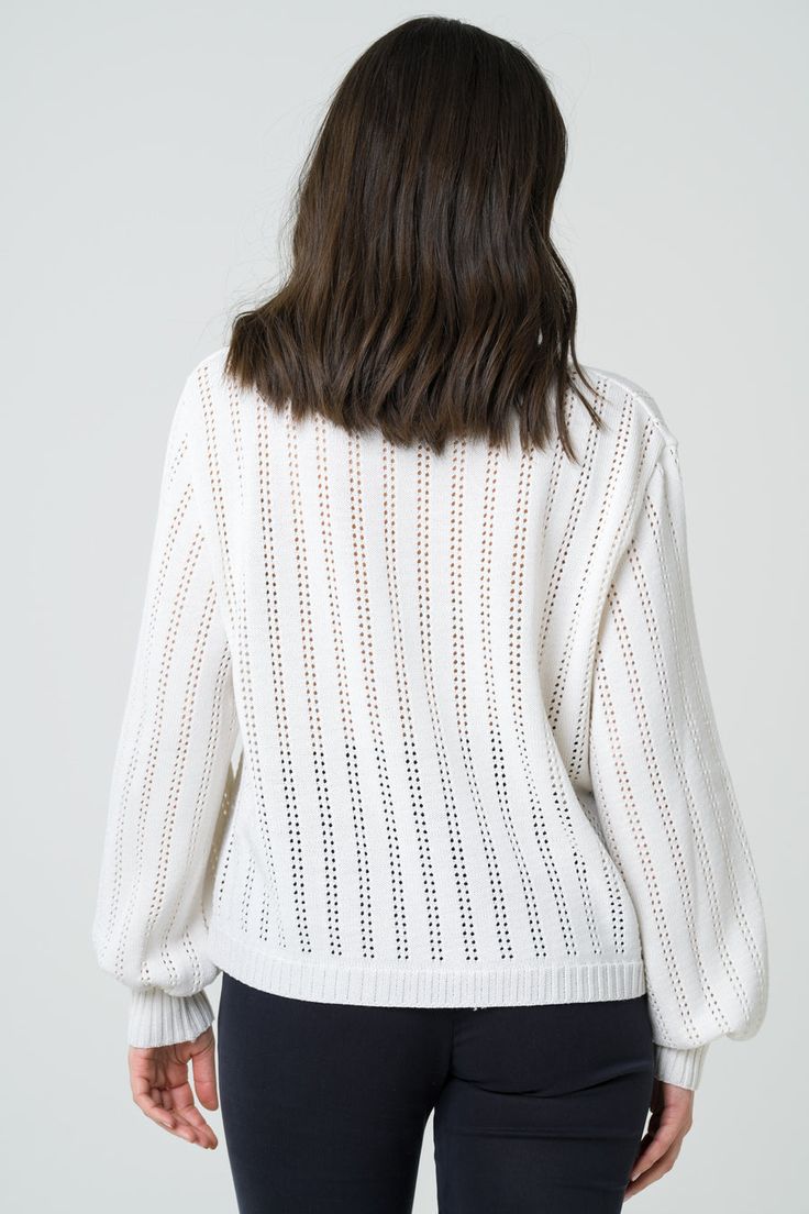 – Openwork sweater with round neck, loose fit and puffed sleeves– The model is 172 cm tall and wears a size M.– This sweater has a loose fit, take a size smaller for a more fitted fitColor: Off-WhiteComposition: 100% merino wool certified OEKO-TEX® 100 and mulesing-free.Manufacturing: knitted in Chamberet (FR) and made in Roanne (FR).This sweater is made from a natural material that is both comfortable and breathable for the skin. It is carefully made in France by artisans with unique know-how, Openwork Sweater, Ballerina Shoes Flats, Sports Activewear, Skincare Set, Puffed Sleeves, Natural Material, Cardigan Jacket, White Sweaters, Shop Blouses