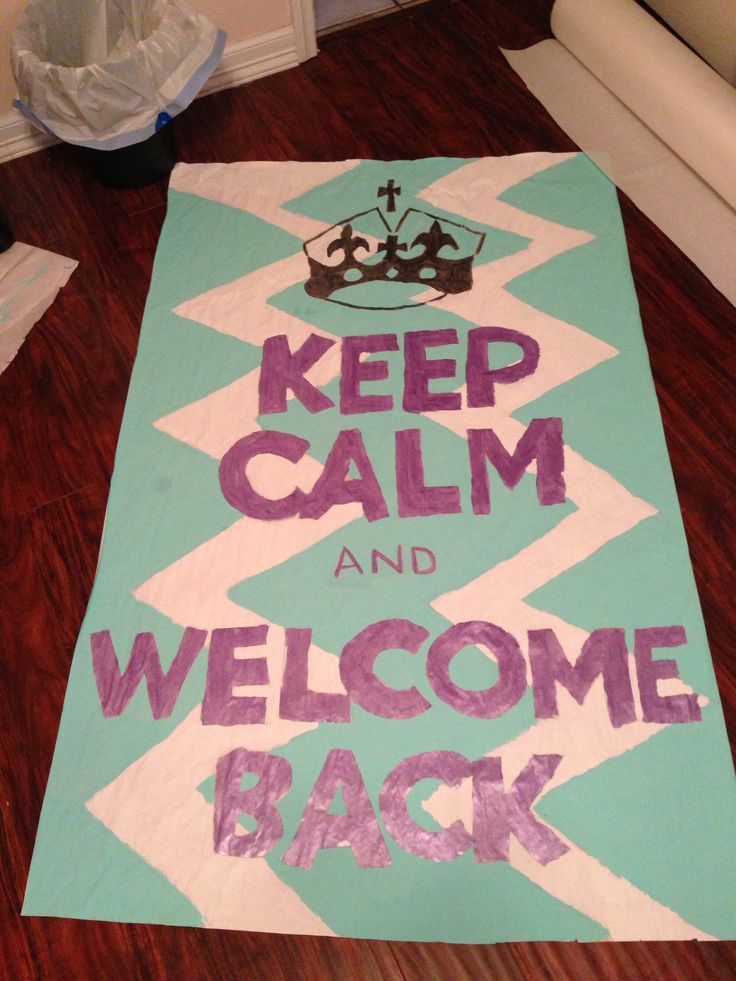 a sign that says keep calm and welcome back