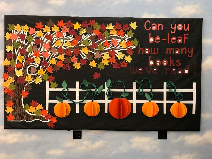 a bulletin board with pumpkins on it and an autumn tree in the background that says can you be - leaf new many books