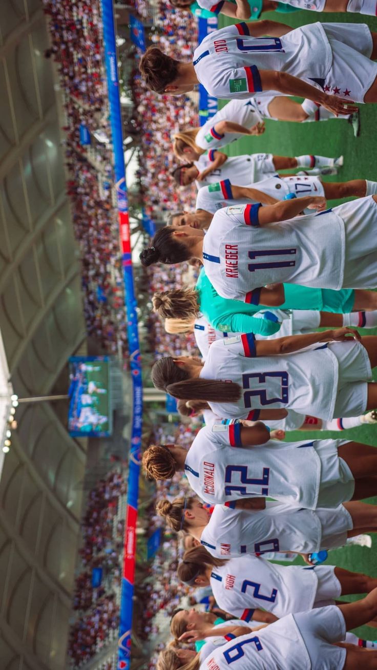 the women's soccer team is lined up