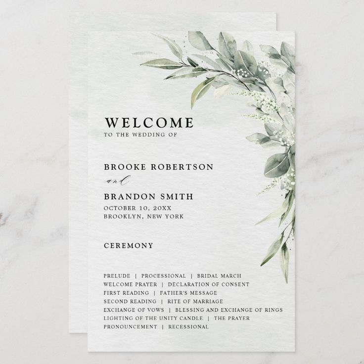 a wedding program with greenery on it