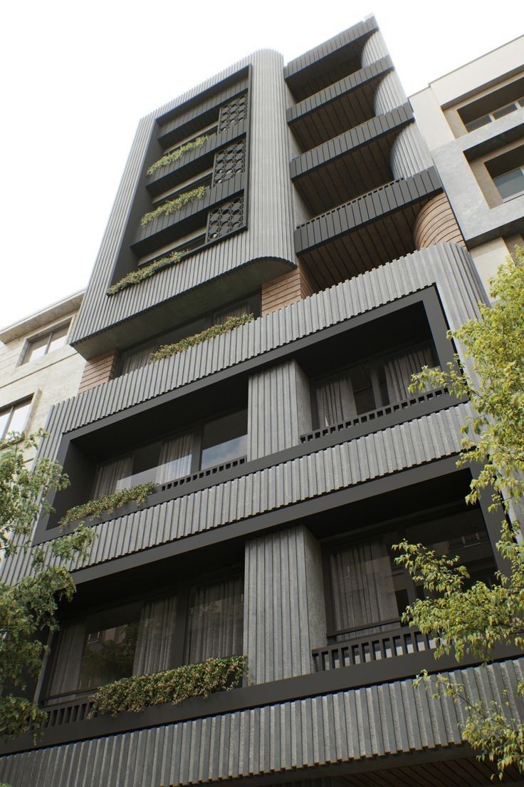 an apartment building with many balconies and windows