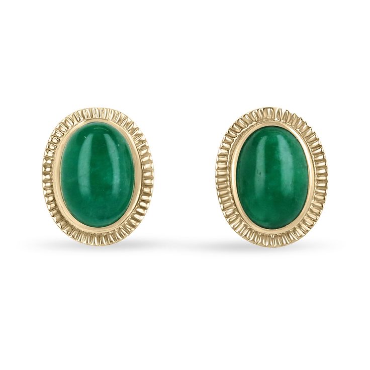 Featured here is a beautiful very rare set of JUMBO large Colombian oval cut cabochon emerald studs dexterously handcrafted in solid fine 14K yellow gold. Displayed are rich deep dark forest green emeralds with very good transparency, accented by a simple bezel set victorian gold mount, allowing for the emerald to be shown in full view. The ethically earth-mined, dark green cabochon Colombian emeralds have a desirable lush green color, a large statement size with excellent qualities. These earrings are ideal for everyday use and are the perfect accessory for any outfit.  Setting Style: Bezel Setting Material: 14K Yellow Gold  Weight: 10.2 Grams Main Stone: Emerald Cabochon Shape: Oval Cut Approx Weight: 19.04-carats (Total) Clarity: Very Good Color: Dark Rich Green Luster: Very Good Treatm Green Gemstone Cabochons For Formal Use, Classic Oval Cabochons For Anniversary, Fine Jewelry Green Cabochons For Formal Occasions, Oval Yellow Gold Cabochons For Formal Events, Green Cabochons For Formal Fine Jewelry, Classic Yellow Gold Gemstone Cabochons, Yellow Gold Gemstone Cabochons In Classic Style, Oval Cabochons For Formal Wear Fine Jewelry, Classic Yellow Gold Polished Cabochons