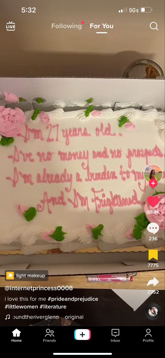 a large sheet cake with pink flowers on it