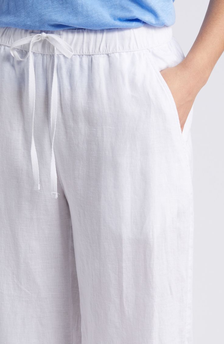 These lightweight linen pants are cut with straight legs and topped with a comfortable elastic-drawstring waist. 29 1/2" inseam; 22" leg opening; 11" front rise; 16" back rise (size Medium) Elastic/drawstring waist Front slant pockets; back patch pockets 100% linen Machine wash, line dry Imported Linen Pull-on Style Bottoms For Loungewear, Relaxed Fit Linen Wide Leg Pants With Tie Waist, Relaxed Fit Linen Bottoms With Tie Waist, Linen Bottoms With Tie Waist And Relaxed Fit, Linen Bottoms With Tie Waist And Loose Fit, White Linen Wide Leg Pants With Straight Hem, Linen Straight Pants With Tie Waist, Linen Bottoms With Tie Waist, Linen Wide Leg Bottoms With Drawstring