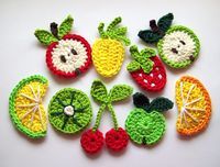 crocheted fruits and vegetables are arranged together