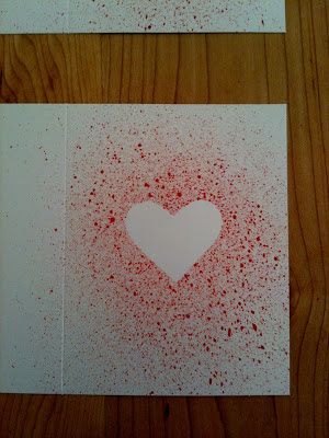 two pieces of paper that have been cut out to look like a heart on them