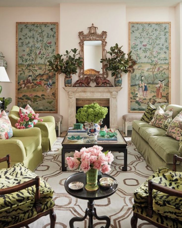 a living room filled with furniture and flowers