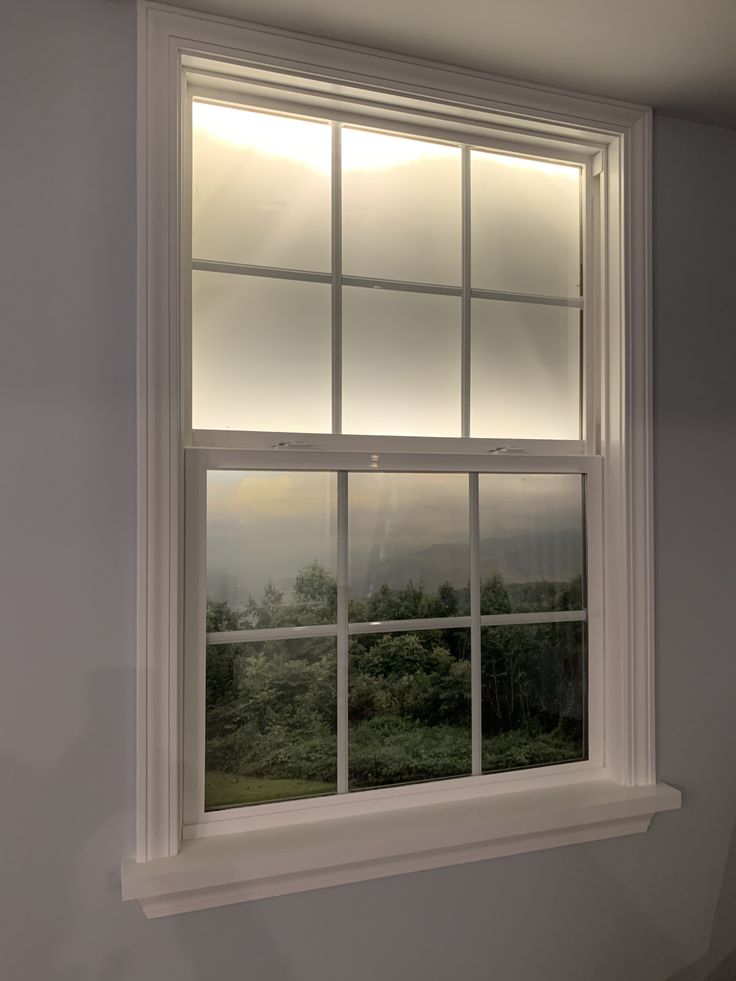 a window that is in the corner of a room