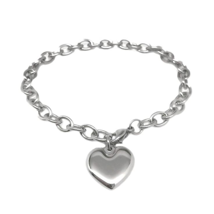 Great worn as is, can easily add charms too! This polished mirror finish stainless steel heart bracelet is a classic that will never go out of style. Since it is stainless steel, it is hypoallergenic (won't turn your wrists green), will never tarnish and is extremely durable. The chain measures a little under 1/2 inch in width with oval links. To clasp the bracelet at the end, measure your wrist, and add 1 inch. The bracelet is fully adjustable into any link in the cable chain but recommend orde Silver Heart Jewelry, Puffy Heart Charms, Silver Bracelets For Women, Bangle Bracelet Set, Charm Chain, Stainless Steel Bangles, Waterproof Jewelry, Silver Chain Bracelet, Metal Bracelets