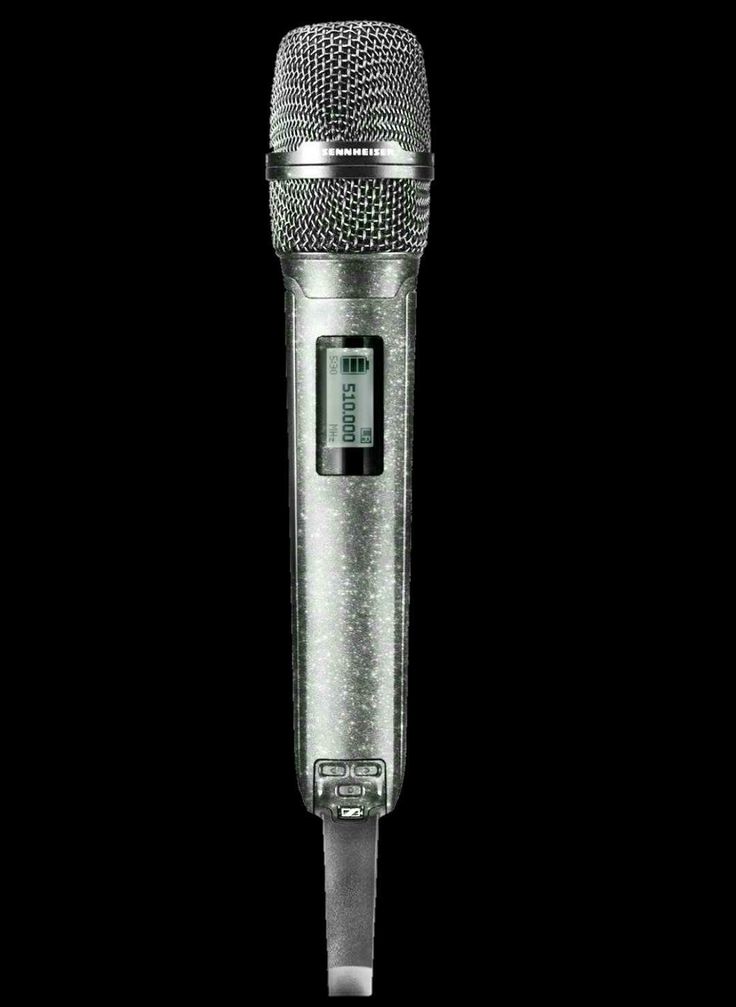 an old fashioned microphone on a black background