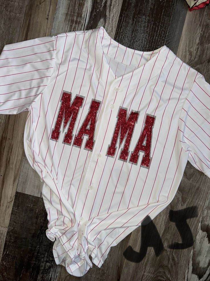 These Custom MAMA Baseball Jerseys have been so popular on Facebook I decided to bring them to ETSY!  I can do anything on front instead of mama just please specify otherwise it will say Mama.  Please leave all Info in the comment, If I can't get the color font you need I will message you! Christmas Cricut, I Can Do Anything, Clothing Diy, Oct 11, Baseball Jersey, Baseball Jerseys, Do Anything, I Decided, Diy Clothes