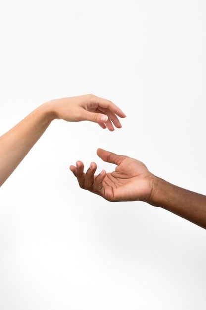 two people reaching out their hands to touch each other's hand, against a white background