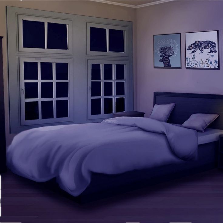 a bed sitting in a bedroom next to a window with two pictures on the wall