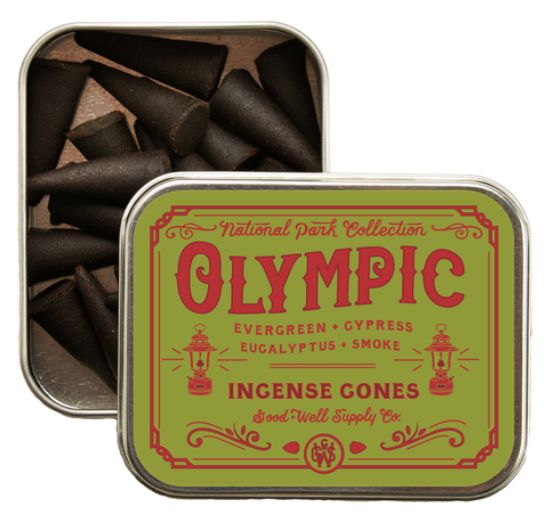 an open tin of chocolate candies with the word olympic written on it in red and green