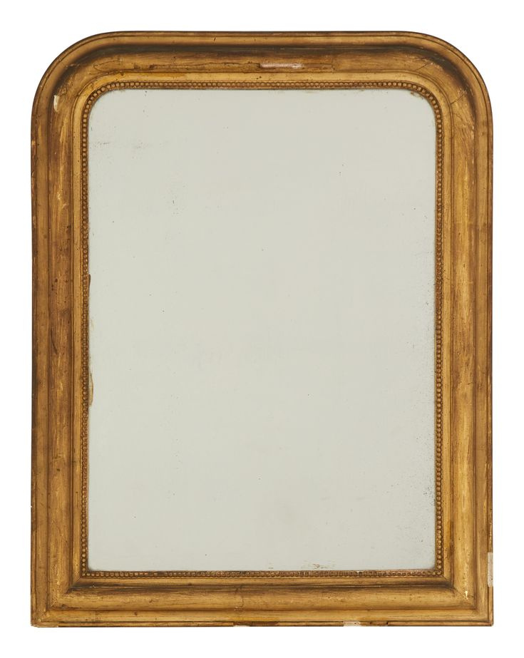 an old gold framed mirror on a white background