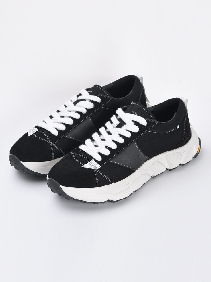 Editor's NotesAIMS Studios’s sneakers feature basic design and leather blend fabric.- Lace-up sneakers- Leather blend fabric- Logo detail in tongue- Stitch detail around upper- Logo label in upper and back- Bold outsole with soft cushioningMeasurements(in.)- Size: KR230mm(US5) - KR280mm(US10)- Heel height: 1.8in.- Please order half size smaller than your normal size.Composition & Care- (Outshell) Leather, Cotton (Lining) Polyurethane (Insole) Latex, Polyurethane (Sole) LCS EVA, Rubber- Pleas Black High-top Sneakers With Contrast Sole For Jogging, Dynamic Lace-up Sneakers With Contrast Sole, Suede Sneakers With Boost Midsole For Streetwear, Dynamic Low-top Running Shoes With Contrast Sole, Suede High-top Sneakers With Cushioned Footbed, Suede High-top Sneakers With Cushioned Footbed For Streetwear, High-top Sneakers With Contrast Sole For Jogging, Dynamic Sneakers With Contrast Sole, Dynamic Lace-up Running Shoes With Contrast Sole