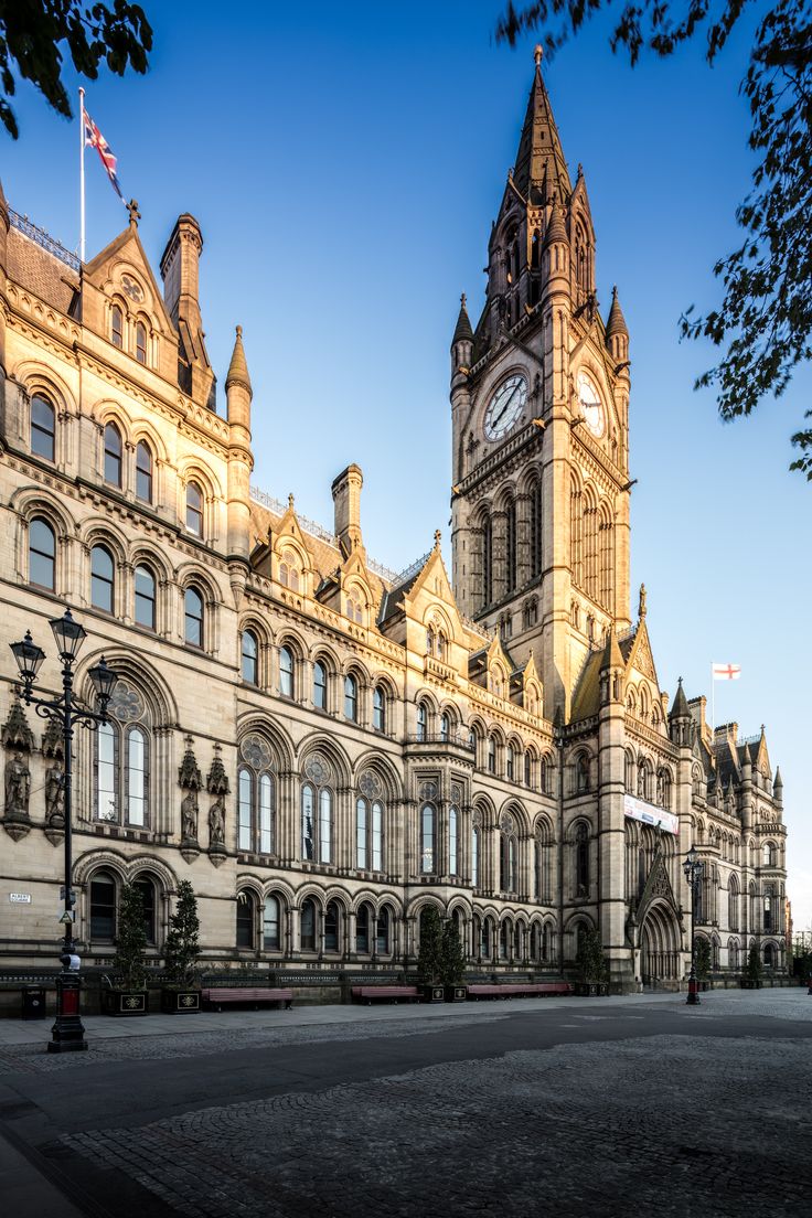 an old building with a clock tower on top