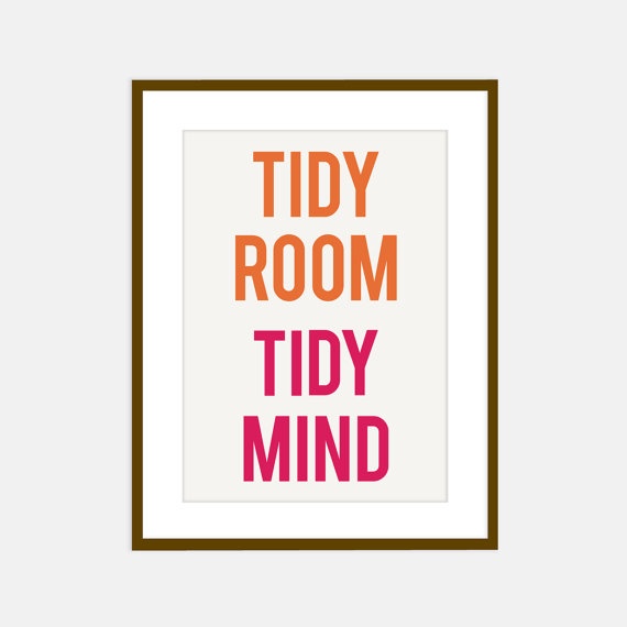 the title for tidy room tidy mind, written in pink and orange on a blue background