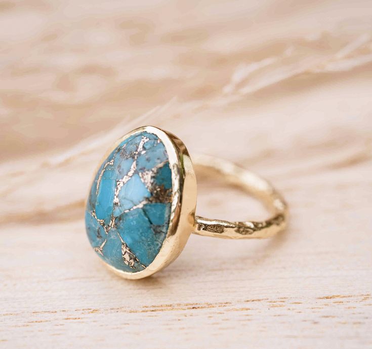 Admiring our Barbara Ring in all it's angles! 😍 Copper Turquoise is natural Turquoise that has been crumbled and reformed to add copper to it, in order to create the beautiful effect of the stone! Would you wear this ring? 👇🏻 Adjustable 14k Gold Turquoise Jewelry, Adjustable Turquoise 14k Gold Jewelry, Adjustable Gold Turquoise Ring Fine Jewelry, Adjustable Gold Turquoise Ring In Fine Jewelry Style, Gold Turquoise Ring With Gemstone, Gold Ring With Gemstone Accents, Adjustable Gold Turquoise Gemstone Ring, Gold Turquoise Ring For Anniversary, Adjustable Gold Turquoise Ring With Oval Shape