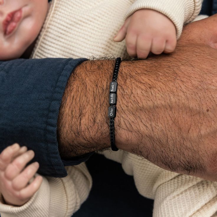 Engraving bracelet for men - Oliver Black. A silver bracelet with a rectangular engraved plate, an exciting and meaningful gift. Each name add a bead, can add more beads in the future You can engrave the names of your children\your names\date etc. High-quality bracelet resistant to shower, sea and pool 💧 Waterproof and guaranteed to never fade 100% handmade SKU : MP350-WP254 Size : The size of the bracelet - 7" or 7.5" + 1" extension chain.​​ Material : stainless steel Black Engraved Bracelets For Everyday, Personalized Black Beaded Bracelets For Father's Day, Engraved Black Braided Bracelets For Gifts, Engraved Black Braided Bracelet For Gift, Black Name Bracelet With Engraving Option, Black Engraved Spiritual Bracelets, Black Spiritual Engraved Bracelets, Spiritual Black Engraved Bracelets, Black Bracelets With Engraving Option For Personalized Gift