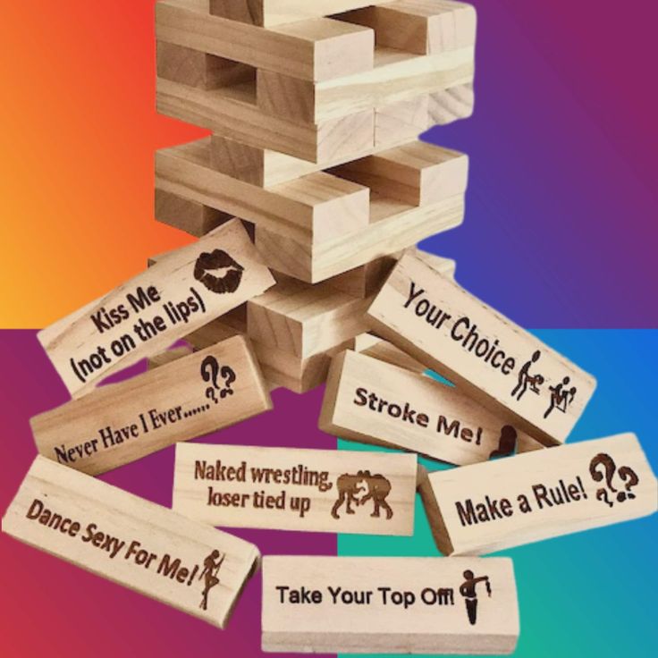 wooden blocks with names on them sitting in front of a rainbow colored background that says, make your top off