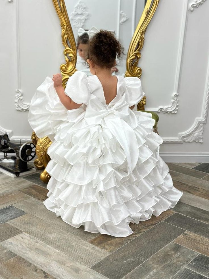 Christening gown girl, White Lace Baptism & Christening Dress, Toddler Baptism Dress 2t, baptismal dress, Baby flower girl, blessing dress White Satin Ruffle Detail Short Front Long Back Baptism and Birthday Dress Presenting a meticulously crafted masterpiece designed with a personalized touch to make your special occasions truly unforgettable! This elegant dress in white satin, featuring a short front and a long back with ruffle details, exudes enchanting charm. This magnificent design seamless Elegant Ruffles Gown For Confirmation, Elegant Princess Dress With Ruffles For First Communion, Princess Style Baptism Dress Ball Gown For Wedding, Elegant Ruffled Pageant Dress For First Communion, Princess Style Ball Gown Baptism Dress For Wedding, Princess Style Ball Gown With Ruffles For First Communion, Princess Style Baptism Dress Ball Gown, White Ruffled Princess Dress For Baptism, Elegant Ruffled Pageant Dress For Baptism