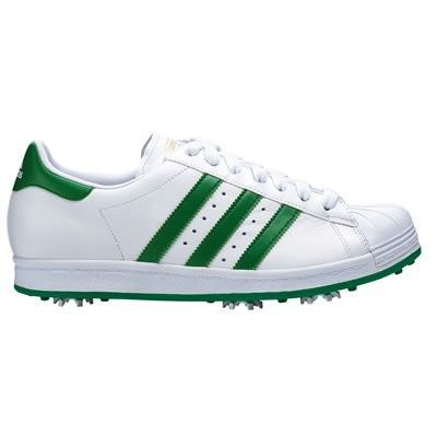 a white and green adidas sneakers