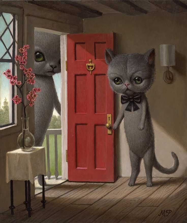 two cats are standing in front of a red door and one is wearing a bow tie