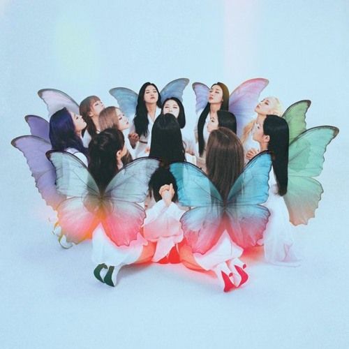 a group of women sitting on top of each other with butterflies flying above their heads