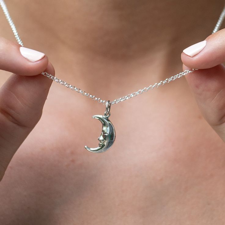 This delicate sterling silver moon charm necklace contains the quirky yet warm features of the man on the moon looking out in protection. As one of the oldest symbols in the world, our perfect crescent design represents new beginnings and the ability to turn dreams into reality.  All our charms attach with a clip-on clasp and are compatible with all other leading charm jewellery brands. Simply clip-on or slide-on to a chain, charm bracelet or charm carrier necklace.  All Lily Charmed jewellery c Silver Necklace Women, Unique Jewelry Silver, Jewellery Inspo Silver, Handmade Metal Necklaces, Necklace Inspo Silver, Cute Necklaces Silver, Pretty Jewellery Silver, Full Moon Jewelry, Silver Moon Necklace