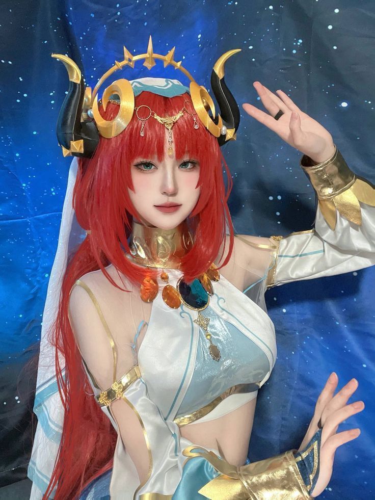 a woman with red hair and horns on her head