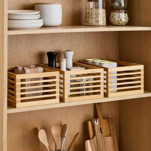 wooden utensils and other kitchen items on shelves