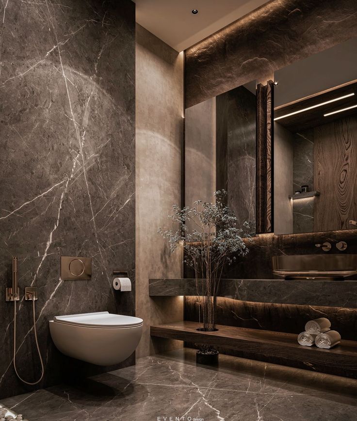 a modern bathroom with marble walls and flooring