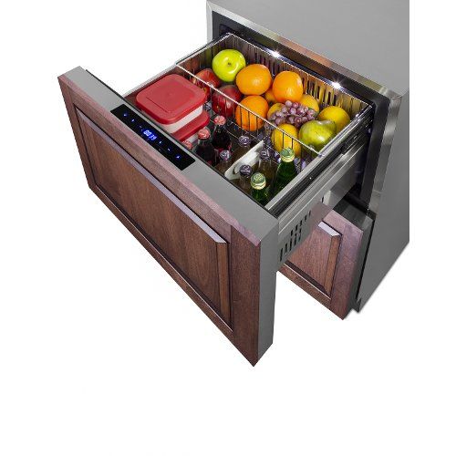 an open refrigerator with many different types of fruits and vegetables in the bottom drawer,