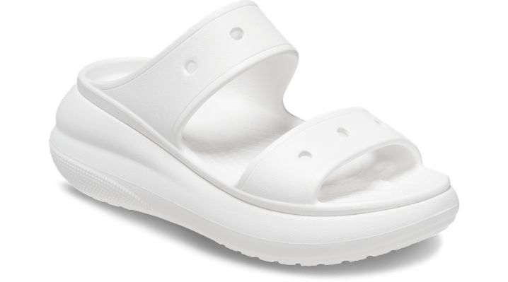 For a fresh new take on your favorite sandal, look to the Classic Crush Sandal. Featuring added height and a bold design, this dynamic new sandal features the popular and versatile two-strap design, plus Jibbitz™ holes on the sandal straps for personalization. The Crocs comfort you love, plus an extra dose of height, attitude, and style.  Crush Sandal Details:    Stylish two strap design  Unique 2-inch / 5.2cm height, measured from floor to heel rest  Customizable with Jibbitz™ charms  Iconic Cr Synthetic Double Strap Platform Slides, White Double Strap Sport Sandals With Cushioned Footbed, Casual Double Strap Slides With Arch Support, Trendy Synthetic Double Strap Slides, Trendy Double Strap Synthetic Slides, Casual White Double Strap Sport Sandals, White Double Strap Platform Sandals, Modern Double Strap Synthetic Slides, White Synthetic Double Strap Footbed Sandals