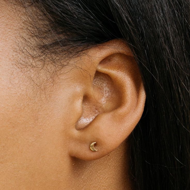 These cuties are great for layering, second hole piercings or a first pair of earrings. [details] - Materials: 14k gold- Accessory Type: Tiny Stud Earrings - Color: Gold- Dimensions: 3.5 x 4.5mm (tiny and adorable)- Comfortable and lightweight- ONE-YEAR WARRANTY Classic Gold Pierced Ear Climbers, Dainty Gold Crescent Cartilage Earrings, Gold Crescent Cartilage Earrings, Hypoallergenic Yellow Gold Piercings, Everyday Hypoallergenic Yellow Gold Piercings, Minimalist Moon-shaped Cartilage Earrings, Minimalist Gold Crescent Cartilage Earrings, Minimalist Yellow Gold Cartilage Earrings For Anniversary, 14k Gold Ear Climbers For Everyday