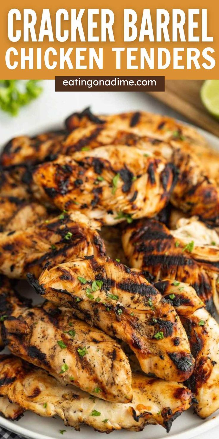 grilled chicken tenders on a plate with cilantro and lime garnish