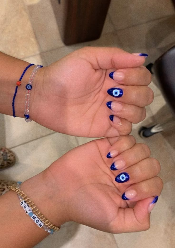 Short Almond Acrylic Nails Evil Eye, Evil Eye Nail Inspo Acrylic, Cute Nails Evil Eye, Acrylic Evil Eye Nails, Aesthetic Nails Evil Eye, Evil Eye Nail Inspiration, Third Eye Chakra Nail Art, Evil Eyes Nail Art, Heart Eye Nail Designs