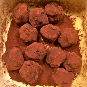 a bowl filled with lots of brownies on top of a counter