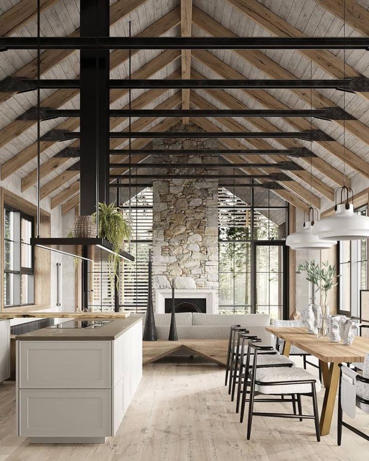 an open concept kitchen and dining area with exposed wood ceiling