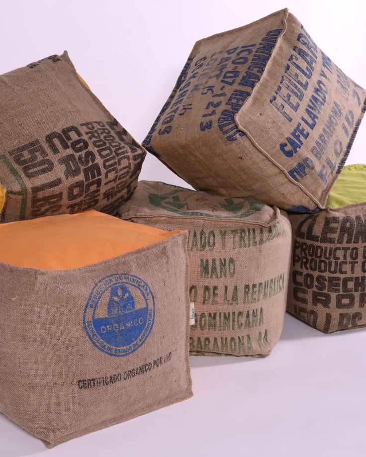 burlap bags are stacked on top of each other